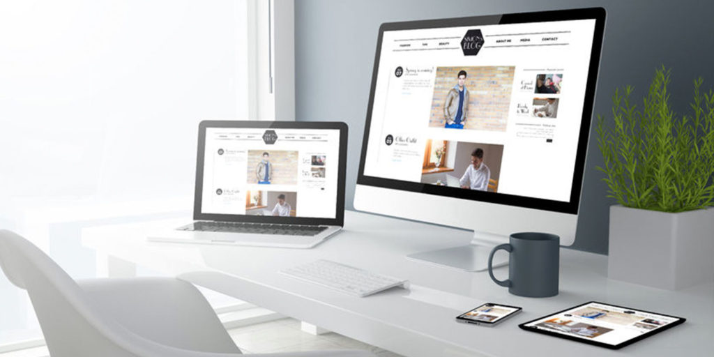 the website design of a business website on a computer, laptop, tablet, and smart phone