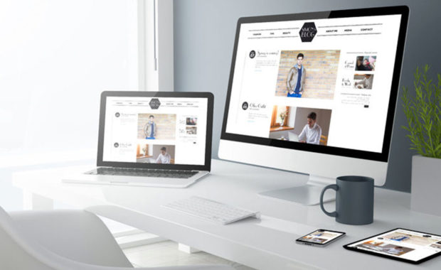 the website design of a business website on a computer, laptop, tablet, and smart phone