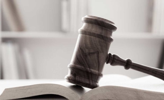 gavel and book symbolizing an attorney who just recently benefitted from a law firm website design overhaul