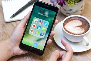 person using social media for digital marketing tips for small businesses