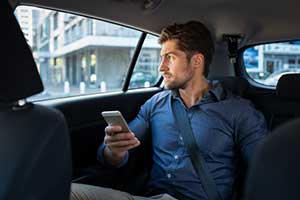 man thinking about a question to ask his voice search assistant