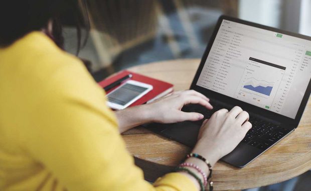 Woman performing effective email marketing