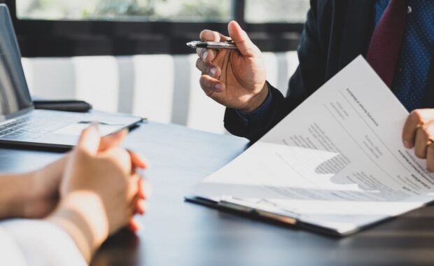 Insurance Agent Signing Policy Documents