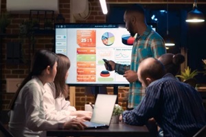 african american employee giving analytics report seo for financial services presentation in business meeting