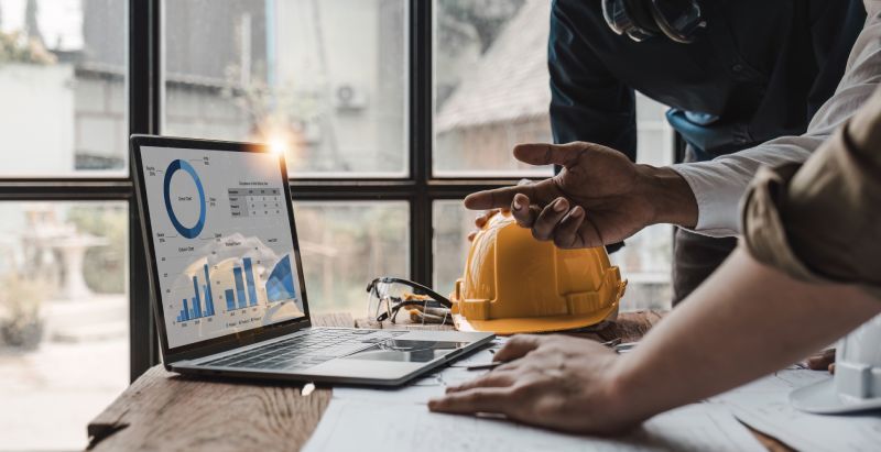 Contractors Looking At Their Digital Marketing Campaign Analytics
