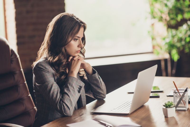Lawyer Reviewing Content For Her Legal Marketing Campaign
