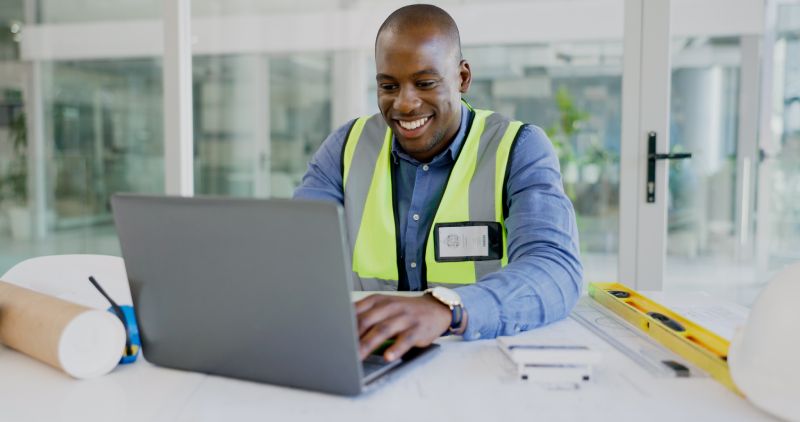 Worker Checking In On His Contractor Marketing Campaign