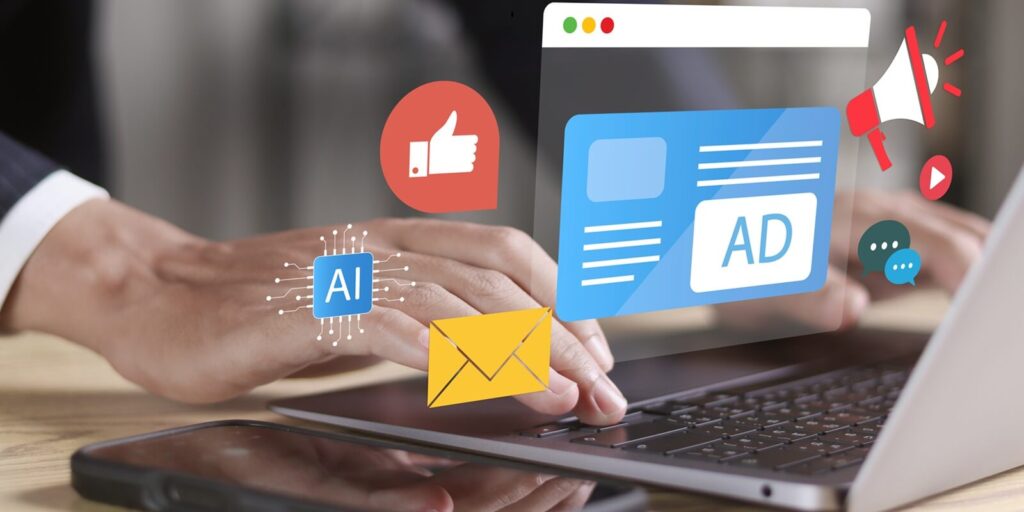 businessman use laptop with online advertising on virtual screen for programmatic Advertising cross targeting