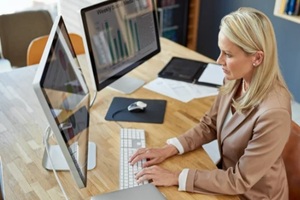 business woman, computer and typing for stats, seo chart and email marketing in office